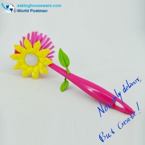 ひまわりの装飾が付いているAkbrandのピンク色の台所皿のクリーニングブラシ