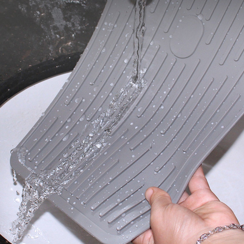 排水パッドを保持する長方形のボタン